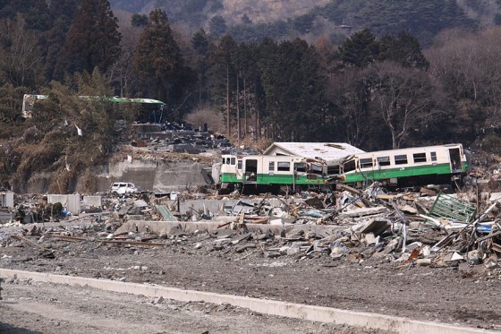 Damaged train and debris carried by tsunami