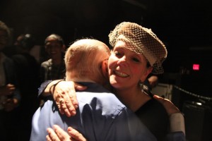 Susan Gerbic gets her award and a hug backstage with Randi